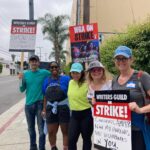 Kirsten Vangsness Instagram - It was especially special today with the @criminalminds energy @charliedewdrop (our proletariat deacon of goodness and cm writer snark) @mzginags (why yes that IS reoccurring guest actor/strike sign writer Agent Garcia as well as prolific 1/2 comedy scribe Gina Garcia Sharp) @chikiguna (winning for signage, garlic bread investigations and CM writers room words of deep mystery ) @jaynearcher (single-handedly writing 76 percent more cats into cm episodes) Take care of the babies. By “babies” I mean hard working writer humans who make the tv and movie sausages that we all eat. #wgastrike