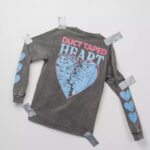Kris Collins Instagram - Wear your heart on your sleeve 🖤💙 The DUCT TAPED HEART collection is out now for a limited time! Take a peek at ottobykris.com