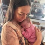 Kristen Doute Instagram - “it matters only that you love.” dear lennon james, i knew i loved you before i met you. holding your tiny little hand and giving you your very first crystal ✨ made my heart explode. you have the best mommy and daddy in the world. i know it’s hard to open your little eyes but today, you peered into my soul. 🤟🏽 i love you, sweet lennie! i can’t wait for your first tattoo. 🎼