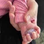 Kristen Doute Instagram - “it matters only that you love.” dear lennon james, i knew i loved you before i met you. holding your tiny little hand and giving you your very first crystal ✨ made my heart explode. you have the best mommy and daddy in the world. i know it’s hard to open your little eyes but today, you peered into my soul. 🤟🏽 i love you, sweet lennie! i can’t wait for your first tattoo. 🎼
