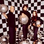 Kristin Kreuk Instagram - nothing screams hot like 3 actors dressed in black and handling balls. #happynewyear2024 #smallville #tbt