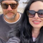 Krysten Ritter Instagram - Heaven is a cold overcast beach day for this vampire 🧛‍♀️ @geoffmstults has been my friend for almost 15 YEARS and remains one of the best eggs around. 🌊