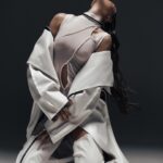 Kseniia Mishyna Instagram – Ми живемо у пошуках любові та щастя у зовнішньому світі. Ніби вони є товаром. Але ні любов ні щастя не можуть бути отримані або придбані, як дешевий костюм.

У гонках за «чарівною пігулкою» існує лише залежність від задоволень з подальшими болем та розчаруваннями.

Дилема сучасного світу полягає в тому, що ми намагаємося знайти любов не зсередини, а зовні. Але це лише призводить до збільшення думок та питань.
Намагаючись зрозуміти внутрішню силу любові, чомусь сприймаємо її, як щось окреме, замість того, щоб ототожнювати з власною природою.

Пошуки любові зовні- помилка. Любов може бути знайдена тільки всередині.

Гонка за задоволеннями, які переплутали з любовʼю, вже давно перетворилася на патологію, а життя – на пасивне підпорядкування.
 
Подивіться у вічі дитині – там є відповідь. Там живе чистота і любов, поки ще не обтяжені ілюзіями та наративами цього світу. 
 
Ви ще вірите, що любов врятує ?

Photo @polipollpolina 
Style @hi_klima
Hair @purpruss 
Make @my.shura