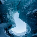 Kyle Krieger Instagram - I walked inside my first ice cave today on my first glacier walk — it was epic and so beautiful. Then rode home nekked after getting pummeled by an arctic wave on the beach which was the result of few questionable choices!!