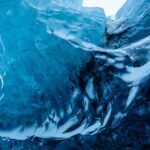 Kyle Krieger Instagram - I walked inside my first ice cave today on my first glacier walk — it was epic and so beautiful. Then rode home nekked after getting pummeled by an arctic wave on the beach which was the result of few questionable choices!!