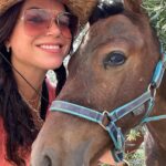 Lana Parrilla Instagram - After 17yrs, I decided to finally come back to the Sierra Nevada Mountains to ride with the best horseman in all of España at the @caballos_la_querencia campo 🐴 🇪🇸 I met my dear friend Fernando Reyero in the summer of 2006 when I decided to move to Spain to study Spanish and brush up on my horseback riding skills 3x a week for nearly 5 months. And where better than the Andalucia in España, right! Granada, Spain became one of my most favorite cities in the world. As someone who’s Spanish speaking skills were poor, you can imagine how intimidating it was to move to a foreign country, not knowing anyone and trying to connect with people who don’t speak your language. Luckily for me, I met one person who really helped me feel welcomed. I was immediately embraced by Fernando who’s English is perfect. He’s not only an incredible teacher and horseman, he’s a wonderful writer and a study of multiple languages. So when I arrived, he greeted me in English, Spanish and French and said, “Which do you prefer?” I replied, “English for now.” 🫣 If you’re looking for adventure on horseback in one of the most stunning places in the world, look no further. Fernando has the most beautiful horses & pups that will melt your heart upon meeting them. He’s created such a wonderful family with these animals and they will all go with you on the journey up the mountain and wait for you while you cool off with a refreshing drink & tapas while overlooking the impressive views of the Sierra Nevadas. This magical experience will keep you smiling for days! For the past 17yrs I’ve wanted to live in this part of Spain. I’ve honestly never been happier. Living with just my basic needs, surrounded by beautiful people, food and culture. And since this trip, I feel like I’m getting closer to that dream. Yay! Who knows, maybe we’ll end up riding together one day! 🤞 Plz go to @caballos_la_querencia for more information on how to have to the adventure of a lifetime. And please make sure to give Fernando a big hug for me! ❤️🇪🇸🐴🍻 #adventure #españa #horsebackriding #andalucia #spain #horses #riding #caballos #friendship #supportsmallbusiness #happiness #caballoslaquerencia #potd