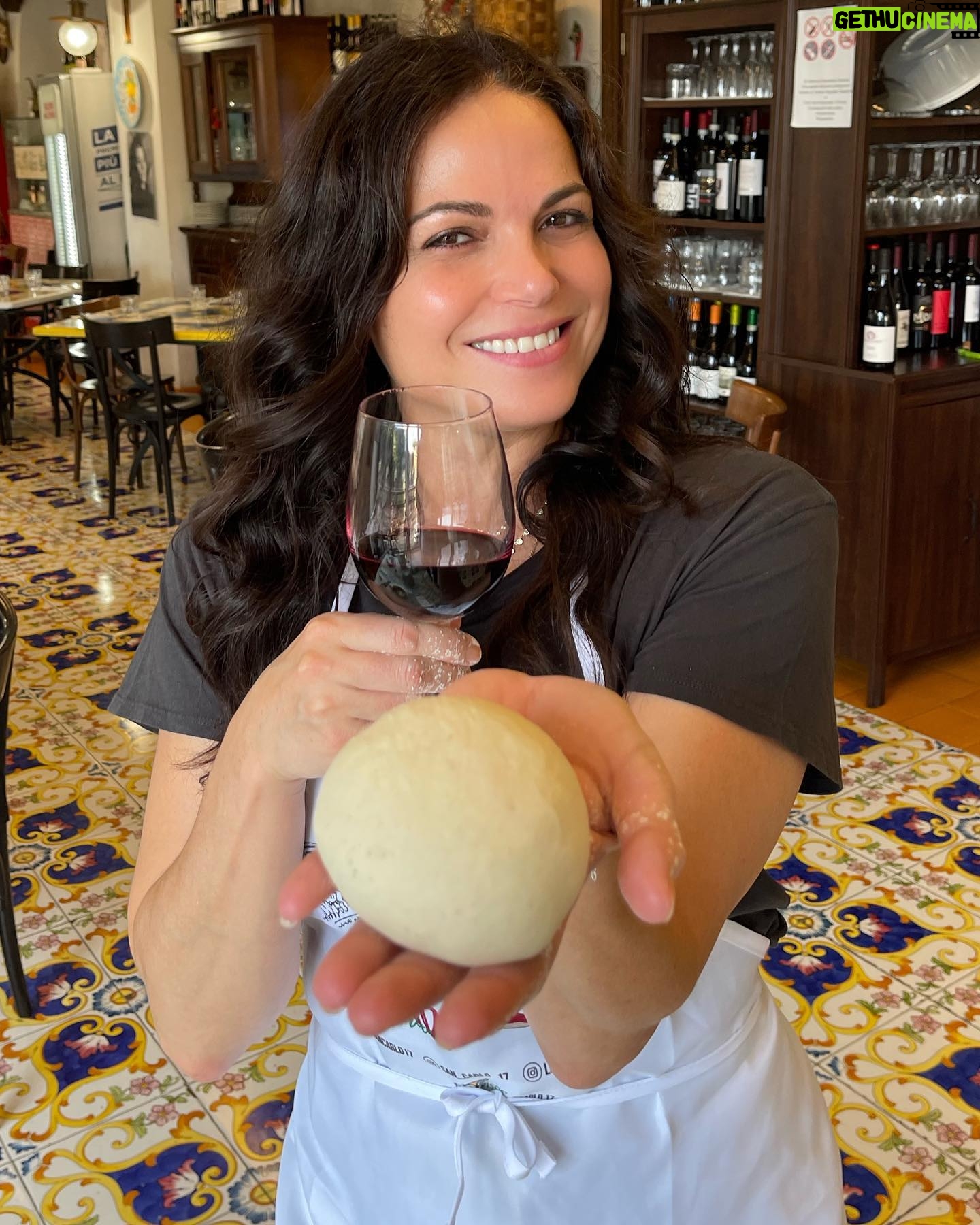 Lana Parrilla Instagram - Mangiare mangiare! Is literally all I want to do when in Napoli! All the smells of street food everywhere you go is so highly intoxicating and iniquitously tempting! Universally, Napoli has some of the greatest food and I was literally put in a time machine back to my grandmothers dinner table yesterday tasting everything! A proud Sicilian!!! Yes Neapolitans and Sicilians are the same! ๐ค Naples also happens to be the pizza capital of the world. So I HAD to come here to learn HOW to make their traditionally moist, perfectly thin dough pizza. And who better than Luigi Marra to guide me at his famous restaurant @san_carlo_17 ๐ What a blast! Btw, making pizza is much more challenging art than I thought. Not only do you have to get the measurements right, and how much to use when, you have to know temperatures, inside the oven and outside the oven. The temperature of the air, the water, my fingers and my palms all have an impact on the dough. I felt like I was in a pizza chemistry class. ๐ค๐๐ Chef Luigi is an excellent teacher with a wonderful sense of humour and an enormous amount of patience. Heโs extremely knowledgeable, a professor of the craft and reminded me of how crappy my math skills were when he started adding up the amount of grams per ingredient ๐ตโ๐ซ It truly was such a pleasure to learn the secrets behind making a Neapolitan pizza by the master himself! Respect โ๐ฝ Grazie mille Luigi! ๐๐ฎ๐น๐โค๏ธ If anyone is looking for a cool experience while in Naples, donโt miss out on this one! โญ๏ธ #italy #neapolitan #pizza #cookingclass #naples #newskills #mangiare #italian #dna #foodie #potd