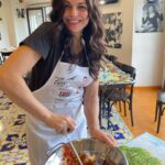 Lana Parrilla Instagram - Mangiare mangiare! Is literally all I want to do when in Napoli! All the smells of street food everywhere you go is so highly intoxicating and iniquitously tempting! Universally, Napoli has some of the greatest food and I was literally put in a time machine back to my grandmothers dinner table yesterday tasting everything! A proud Sicilian!!! Yes Neapolitans and Sicilians are the same! 🤝 Naples also happens to be the pizza capital of the world. So I HAD to come here to learn HOW to make their traditionally moist, perfectly thin dough pizza. And who better than Luigi Marra to guide me at his famous restaurant @san_carlo_17 🍕 What a blast! Btw, making pizza is much more challenging art than I thought. Not only do you have to get the measurements right, and how much to use when, you have to know temperatures, inside the oven and outside the oven. The temperature of the air, the water, my fingers and my palms all have an impact on the dough. I felt like I was in a pizza chemistry class. 🤓🍕📖 Chef Luigi is an excellent teacher with a wonderful sense of humour and an enormous amount of patience. He’s extremely knowledgeable, a professor of the craft and reminded me of how crappy my math skills were when he started adding up the amount of grams per ingredient 😵‍💫 It truly was such a pleasure to learn the secrets behind making a Neapolitan pizza by the master himself! Respect ✊🏽 Grazie mille Luigi! 💋🇮🇹🍕❤️ If anyone is looking for a cool experience while in Naples, don’t miss out on this one! ⭐️ #italy #neapolitan #pizza #cookingclass #naples #newskills #mangiare #italian #dna #foodie #potd