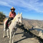 Lana Parrilla Instagram - After 17yrs, I decided to finally come back to the Sierra Nevada Mountains to ride with the best horseman in all of España at the @caballos_la_querencia campo 🐴 🇪🇸 I met my dear friend Fernando Reyero in the summer of 2006 when I decided to move to Spain to study Spanish and brush up on my horseback riding skills 3x a week for nearly 5 months. And where better than the Andalucia in España, right! Granada, Spain became one of my most favorite cities in the world. As someone who’s Spanish speaking skills were poor, you can imagine how intimidating it was to move to a foreign country, not knowing anyone and trying to connect with people who don’t speak your language. Luckily for me, I met one person who really helped me feel welcomed. I was immediately embraced by Fernando who’s English is perfect. He’s not only an incredible teacher and horseman, he’s a wonderful writer and a study of multiple languages. So when I arrived, he greeted me in English, Spanish and French and said, “Which do you prefer?” I replied, “English for now.” 🫣 If you’re looking for adventure on horseback in one of the most stunning places in the world, look no further. Fernando has the most beautiful horses & pups that will melt your heart upon meeting them. He’s created such a wonderful family with these animals and they will all go with you on the journey up the mountain and wait for you while you cool off with a refreshing drink & tapas while overlooking the impressive views of the Sierra Nevadas. This magical experience will keep you smiling for days! For the past 17yrs I’ve wanted to live in this part of Spain. I’ve honestly never been happier. Living with just my basic needs, surrounded by beautiful people, food and culture. And since this trip, I feel like I’m getting closer to that dream. Yay! Who knows, maybe we’ll end up riding together one day! 🤞 Plz go to @caballos_la_querencia for more information on how to have to the adventure of a lifetime. And please make sure to give Fernando a big hug for me! ❤️🇪🇸🐴🍻 #adventure #españa #horsebackriding #andalucia #spain #horses #riding #caballos #friendship #supportsmallbusiness #happiness #caballoslaquerencia #potd