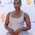 Lashana Lynch Instagram – “I was told to shut up or I would never work again.” Baroness Floella Benjamin. Thank you for the best advice backstage. Your words were as aligned as our rogue lips 💋🙏🏾✨