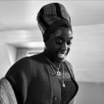 Lashana Lynch Instagram - Celebrating International Women’s Day honoring the one and only Mrs Rita Marley. This woman right here is beyond words. I’ll be telling my children and their children about getting to know her as a spirit and an icon in this lifetime with the biggest grin and the proudest heart. If you don’t yet know her story and enjoyed her presence in @onelovemovie, please read about her, listen to her words and her music and feel the impact she’s had on the Caribbean, Africa and many around the world. Thank you, @officialritamarley, for everything that you are and will continue to be. One love ✊🏾💛✨