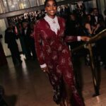 Lashana Lynch Instagram - Thank you @prada for this delicious custom look for @bafta last night. The baby hairs were proud to live in this moment, too! 💁🏾