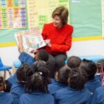 Laura Bush Instagram - Reading opens doors to imagination and opportunity. That’s why today, I celebrated @unitedway’s #ReadAcrossAmerica by reading to first grade students at J.N. Ervin Elementary School in Dallas. By reading to students in your communities, you can inspire a lifelong love of reading. Thank you, Mrs. Wallace, for letting me share my love of reading with your classroom. 📚