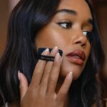 Laura Harrier Instagram - Stay flawless. @lauraharrier wears new Vanish Airbrush Pressed Powder in Translucent Tan. #HourglassCosmetics