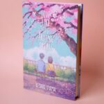 Laura Heikkala Instagram - The bookstore edition of Love Like The Falling Petals by Uyama Keisuke, featuring a cover drawn by me, is now available in English around the world! The romance novel from @clover_press is captivating and heart-wrenching. You can pick up a copy at your local bookstore or order through @kinokuniyausa #LoveLikeTheFallingPetals 🌸✨