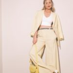 Laura Whitmore Instagram - In suit of sunshine @stellamccartney ☀️ Party shoes @louboutinworld Handmade bow @joepickeringtaylor Pure ‘class’ chain @margaret0connor Second last shot definitely telling Christian my best dad joke! LW X PFW