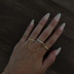 Lauren Luthringshausen Instagram - IYKYK - why would i pick a color and do that to myself i simply don’t have the time @lovevi_nails 💅🏼🫶🏼🎀 #nails #grwm #cleangirl