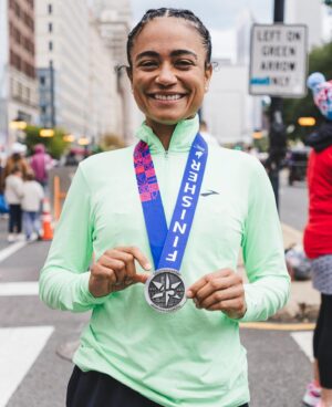 Lauren Ridloff Instagram - Happy #medalmonday! The hard work paid off and I felt like the miles flew by (at least some of them!). Thank you to @brooksrunning @alisondesir @hansonsbrooksodp and @chimarathon for the training, support and an incredible race weekend, and most importantly to my FAMILY for cheering me on every step of the way 🤟🏽🤟🏽I’m already wondering what my next marathon will be…

📸 @jayhallphotos