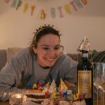 Laurie Hernandez Instagram - happy birthday lovebug. I sure do love you! party time! go get ur party hat! even the wine has a party hat!