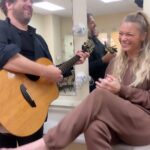 LeAnn Rimes Instagram - the 90’s country music challenge reminded me (and by the comments, a lot of you) how much i loved this song!! i couldn’t resist grabbing greg for a little backstage jam before for the show yesterday… (ignore shamus rushing us in the background 🙄😂) i love you @deanatunes #strawberrywine #cover #backstage #thestorysofartour #countrymusic #90s #deanacarter #throwback