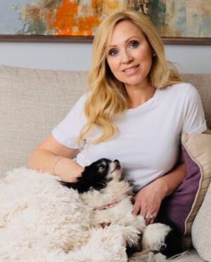 Leigh-Allyn Baker Instagram - Meet Fina. She’s my little ride or die. She wasn’t supposed to live past 8 because of a liver issue. But I make her food and did not vax and she will be 16 in January. Are you a dog person? 🐶#nationaldogday