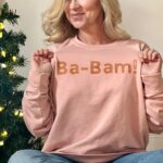 Leigh-Allyn Baker Instagram - This season, a must have is @ornamentanchor - I’ve found so many different ways to use this! Visit Ornament Anchor and make your holiday season a little less stressful! #ornamentanchor #ad #balls #goodluckcharlie #babam
