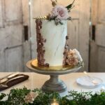 Leigh-Allyn Baker Instagram - Ahhhhh… the wedding cake by @thedottedlime! It was gorgeous! And the food was delicious!!! The second they arrived… all of the wedding planning weight was lifted off of my shoulders! I went to bed dreaming of their chicken Parmesan and woke up craving the cheese biscuits and kale salad! And here’s the best part… No one had a clue it was all gluten free!! #glutenfreefood #glutenfreeweddingcake #weddingcake #thedottedlime #weddingvenue #wedding #catering #weddinginspiration #weddingideas #weddingdress