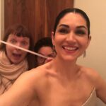 Lela Loren Instagram - Pull it tight! Binge it all!! @altcarb @netflix✨🪐🌓 Danica is gettin’ glamorous for Harlan’s Day and a lil’ something else 🚀🎆 Behind me is our awesome costume designer @cynthiasummers and costumer @wsanchia