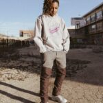 Lena Waithe Instagram - Want to take a piece of #TheChi with you wherever you go? 🚈 COMMENT below using #TheChiGiveaway and TAG a friend for a chance to secure this limited-edition hoodie from our capsule collaboration with @sheilathedesigner! 🩶 18 , U.S. only, additional rules at the 🔗 in bio. Stream new episodes of The Chi FRIDAYS on the #ParamountPlus with SHOWTIME plan.