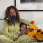 Leona Lewis Instagram - Everything’s a ballad 🪶 this one is dedicated to my little Carmel. It’s a family affair here at everything’s a ballad lol, the baby is running around behind the scenes whilst my hubby @dennisjauch films. Carmel usually only sits for 3 seconds max before she’s off exploring but today she wanted to be on the sofa with me which is why I was so shocked/happy at the end of the video lol 🤍 I chose this section of the song because these words are the closest to describing how I felt when I first met my little babe x