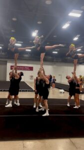 Lexi Brumback Instagram - IT’S SMO✨🔫 💙 #smamily #smoed #calismoed #caliallstars #calibullets #smoedcheer #cheer #competition #stunts
