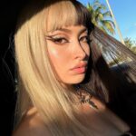 Lexi Brumback Instagram - Idk how I went 23 years without bangs, but I don’t think I’m ever going back 😛🖤🤍