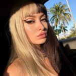 Lexi Brumback Instagram - Idk how I went 23 years without bangs, but I don’t think I’m ever going back 😛🖤🤍