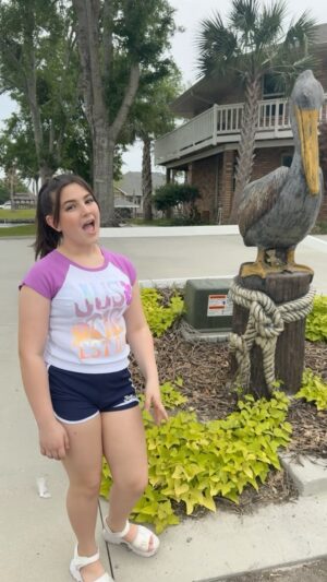 Lexi Rabe Instagram - I love the pelicans in #louisana they love fishing in my backyard! Outfit from @justice 🥰 #heartofjustice #model #actor #tweenstyle