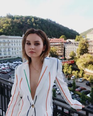 Liana Liberato Instagram - my homage to maggie 🌈 rainbow power suit for #tothestars international premiere ✨ (b&w version now available everywhere)