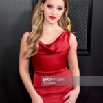 Lilliana Ketchman Instagram - guys I went to the GRAMMYS! WHAT?? such a surreal moment. swipe to see my full dress 🤭 . . . thanks so much @modaglamboutique for the dress, @saxon for the jewelry, and @lashbatz for making my eyes pop all night!! 💜 . #lillyk #Grammys #gettyimages