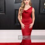 Lilliana Ketchman Instagram - guys I went to the GRAMMYS! WHAT?? such a surreal moment. swipe to see my full dress 🤭 . . . thanks so much @modaglamboutique for the dress, @saxon for the jewelry, and @lashbatz for making my eyes pop all night!! 💜 . #lillyk #Grammys #gettyimages
