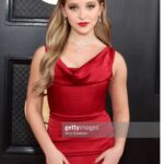 Lilliana Ketchman Instagram - guys I went to the GRAMMYS! WHAT?? such a surreal moment. swipe to see my full dress 🤭 . . . thanks so much @modaglamboutique for the dress, @saxon for the jewelry, and @lashbatz for making my eyes pop all night!! 💜 . #lillyk #Grammys #gettyimages