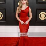 Lilliana Ketchman Instagram - guys I went to the GRAMMYS! WHAT?? such a surreal moment. swipe to see my full dress 🤭 . . . thanks so much @modaglamboutique for the dress, @saxon for the jewelry, and @lashbatz for making my eyes pop all night!! 💜 . #lillyk #Grammys #gettyimages