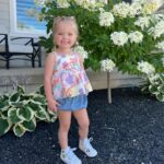 Lindsay Arnold Instagram – Sage’s last day of school vs her first day 🥹🫶 my baby girl!!!!!!! 

Theme for her last day of class was “crazy hat and socks” but for Sage that turned into a full crazy get up 😂 I love this girl so much and watching her grow and learn so much this past school year has been the most rewarding thing. We love our sweet girl! 

#firstdayofschool #lastdayofschool #toddlersofinstagram