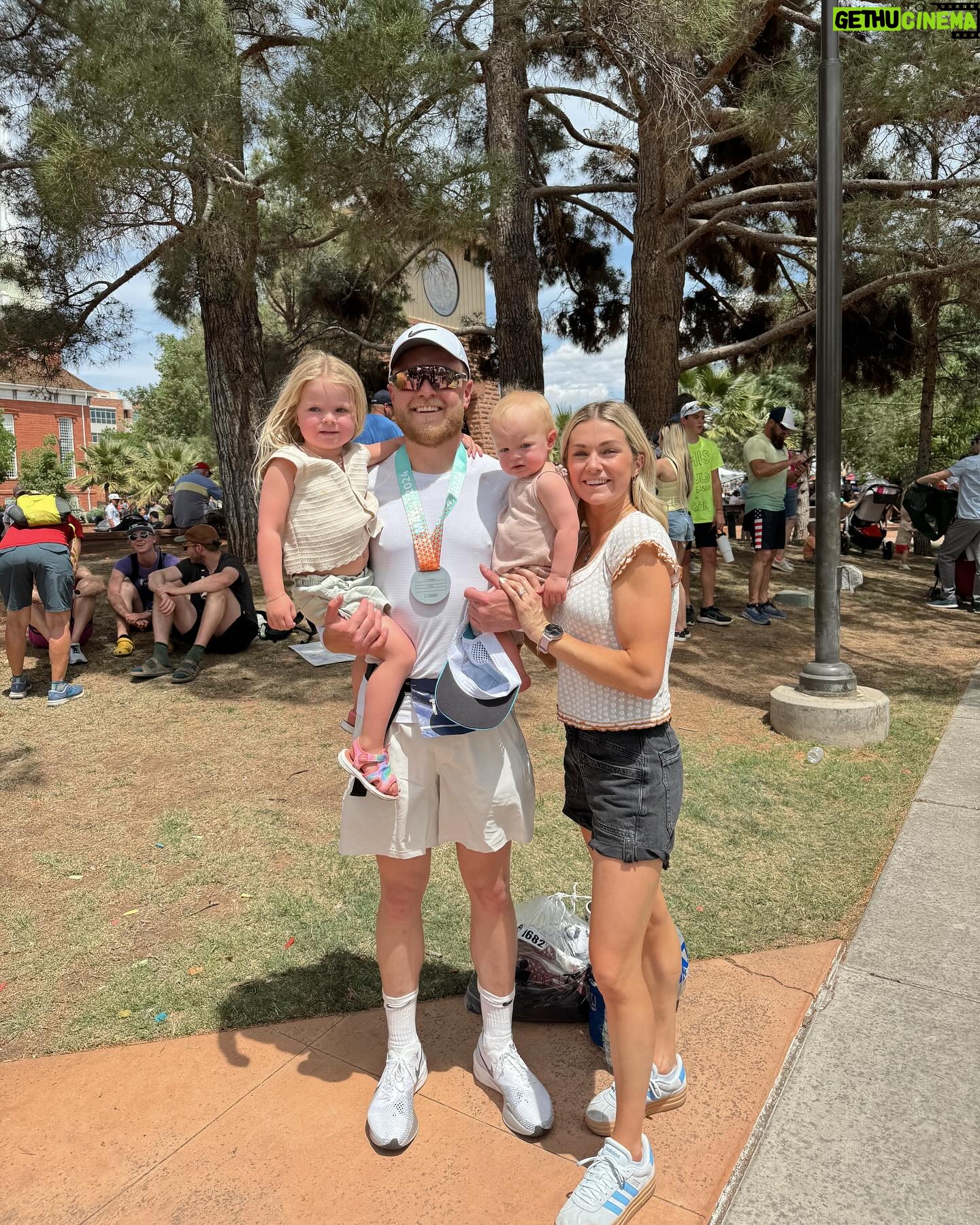 Lindsay Arnold Instagram - IRONMAN 70.3 👏🏼 Sam has trained so hard the past 6 months to prepare for his very first Ironman race and I can't even express how proud I was watching him cross that finish line 🏁 Sage and June were so excited about it too and both wanted to snuggle him immediately after! We love our guy and wow I am just so impressed with everyone who did this race it is no joke! #ironmantraining #ironman #stgeorgeironman