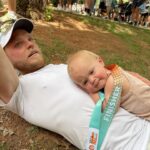 Lindsay Arnold Instagram - IRONMAN 70.3 👏🏼 Sam has trained so hard the past 6 months to prepare for his very first Ironman race and I can't even express how proud I was watching him cross that finish line 🏁 Sage and June were so excited about it too and both wanted to snuggle him immediately after! We love our guy and wow I am just so impressed with everyone who did this race it is no joke! #ironmantraining #ironman #stgeorgeironman