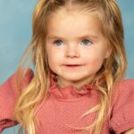 Lindsay Arnold Instagram - Sage's first year of preschool is coming to an end and these before/after pics from her graduation pictures to her first week of school pics make me so emotional 😭🫶 our sweet girl has grown up so much the past year. She is so smart, loving, and kind! I could truly go on and on about how proud I am of her and the girl she has become. It is so special watching your child progress and learn but more than anything it has been so special watching her be the best big sister to June, a sweet and kind friend to everyone she gets to be around, and the sweetest daughter who teaches us probably more than we teach her. We are the luckiest to have our girl Sage 🫶 #preschoolgraduation #toddlerlife #moms