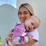 Lindsay Arnold Instagram - June 🫶 our girl is almost a year old and I truly cannot believe how fast time has flown by 🥹 we are so lucky to have our sweet Junie girl she makes every day so much brighter! She is busy as can be and wants to do everything her big sis does. She has been extra cuddly lately and it makes my heart so happy ❤️ we just love her so so much! #babygirl #1yearsold #girlmom