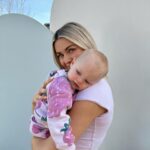 Lindsay Arnold Instagram - June 🫶 our girl is almost a year old and I truly cannot believe how fast time has flown by 🥹 we are so lucky to have our sweet Junie girl she makes every day so much brighter! She is busy as can be and wants to do everything her big sis does. She has been extra cuddly lately and it makes my heart so happy ❤️ we just love her so so much! #babygirl #1yearsold #girlmom