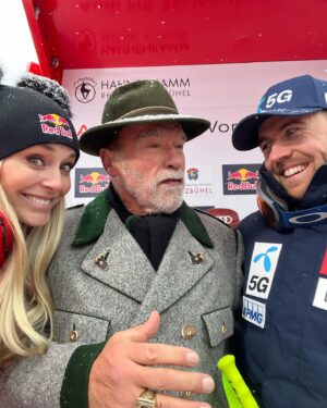 Lindsey Vonn Instagram - Missing Kitzbühel this year…but these memories will stay with me forever… from cheering on my teammates 🇺🇸 with my family, to hanging with @schwarzenegger and @akilde in the finish (miss you this year Alex-heal fast!), hanging with the great @asvindal and Franz Klammer, to skiing the Streif last year at night (and my Dad falling asleep at the start of it 🤦🏼‍♀️😂)… it’s one of the greatest ski races in the world!!! Wishing all the competitors lots of luck! XO 💪🏻🩵⛷️
