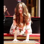 Lisa Marie Presley Instagram - My family and I are so truly honored and grateful to have been asked to put our handprints in such an incredible and historic place together @chinesetheatres on @hwdwalkoffame 🖐️💙 Thank You @wbpictures @elvismovie @bazluhrmann @austinbutler #elvismovie