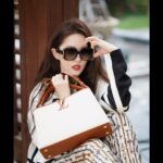 Liu Yifei Instagram - Had a photoshoot after wrap…enjoying the view #LVArchlight @louisvuitton #louisvuitton
