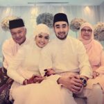Liyana Jasmay Instagram - Forever in my heart, 10 years ago my dad gave me away to this man. Insyaallah until jannah, we shall face challenges and turbulence together. Marriage is not easy, who says it is must be lying. May we both have a wonderful life just like both of my parents, till the end of time. *just look at how babah's face hugging me and his smiley face, mama and babah so happy agaknya sbb dah tak payah nak layan kerenah spoil brat i kot! 🤣 * Always in our prayer Jasmay Bin Md Shah and Habsah Bt Simpon🩷💚 Al Fatihah..