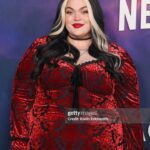 Loey Lane Instagram - There is nothing I love more than a plus-size woman on a red carpet… okay, maybe I love it a LIL extra when it’s me 🖤 Vampy vibes for Spaceman @netflix the other night! A lot of y’all asking about this @killstar dress - it’s the Sitri Long Sleeve Dress and it’s still in stock on their site 🌹 I used to dream about moments like this. I never could have imagined I would experience them in this body. In my daydreams as a teenager, I saw myself as *perfect*, and that meant thin. Taking up as little space as possible on a red carpet. But here I am, still the fat girl in the room. A thousand times more visible than I’ve ever been before. There was a time where that would have ruined me. Now, though? Now I let myself shine the way I was always meant to. I just had to realize I was worthy of letting myself do it all along. 🥹 #plussize #outfitinspiration #plussizefashion #bodypositivity #loeylane